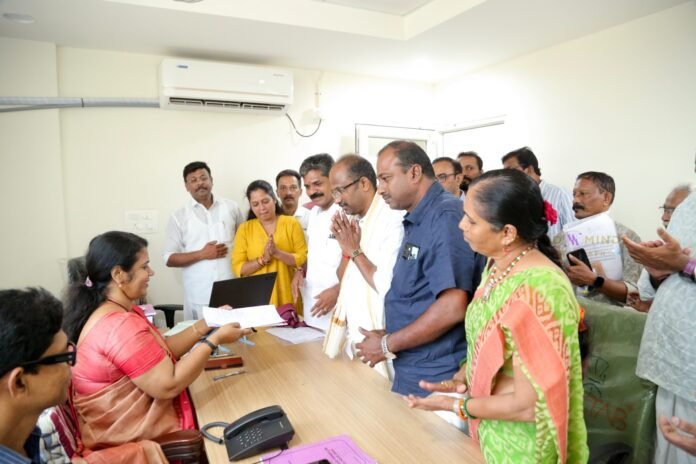 NDA candidate K.V. Bijoy from Ayyappankavu Division of Kochi Municipal Corporation submits his nomination paper to Returning Officer Bindu.