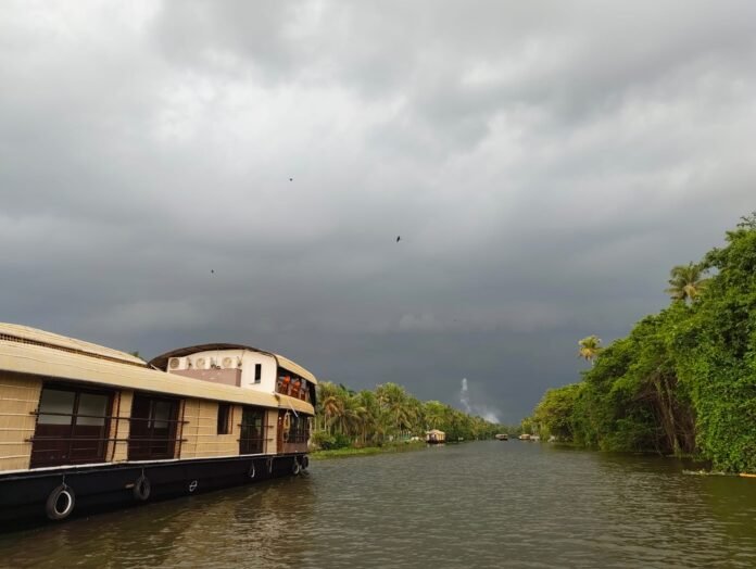 A boat ride enjoying the scenic beauty of Kumarakom backwaters during the evening sunset.